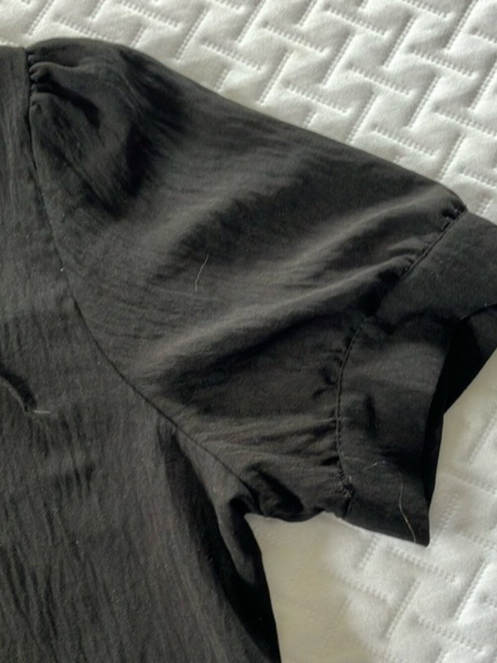 Black Pleated Blouse with Cut Out Neckline